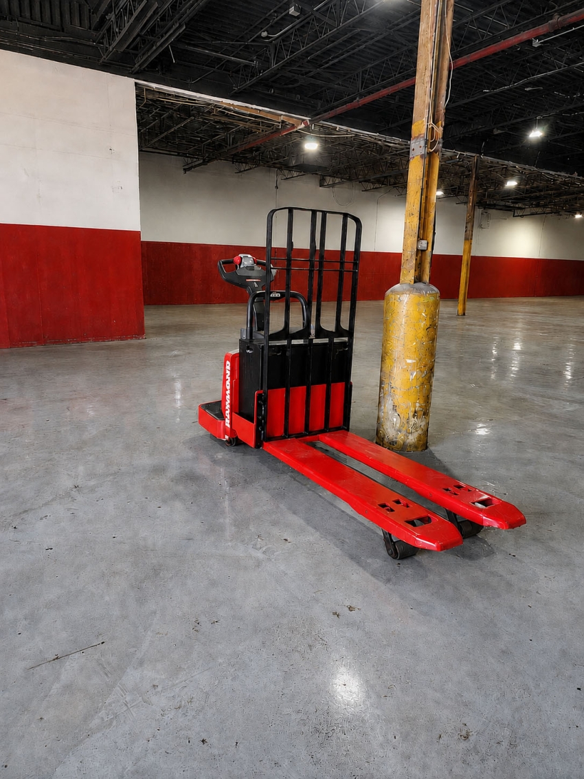 Raymond Electric Rider Pallet Jack 6,000lbs. w/ Charger - 123Forklift